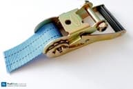 Трещітка і стяжний ремінь